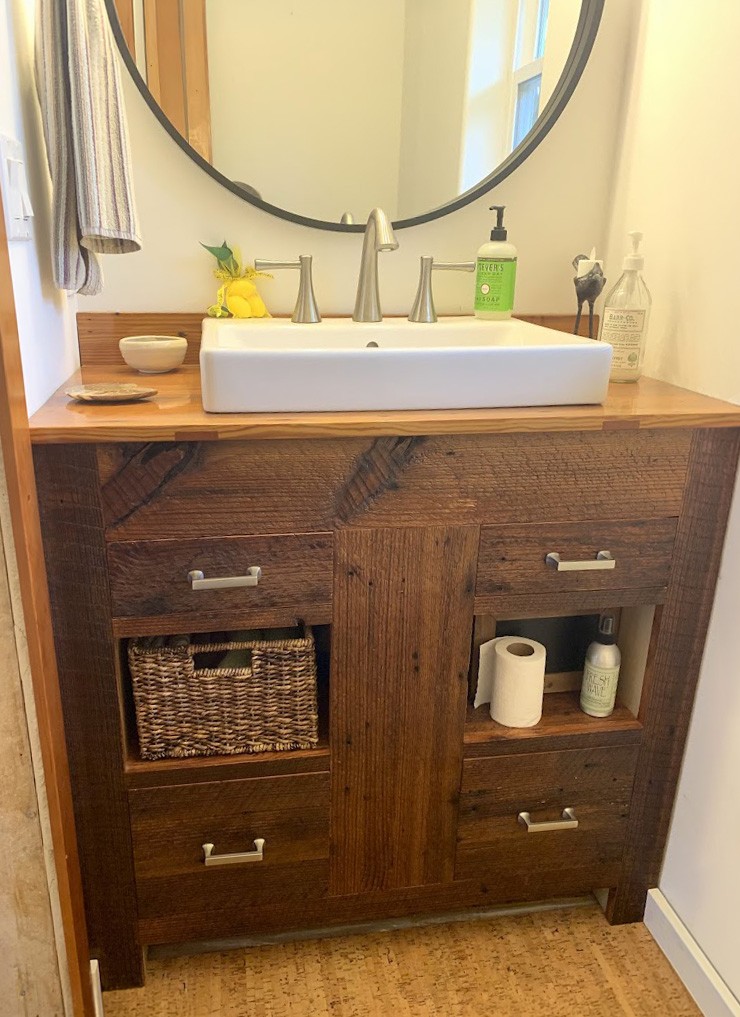 Rustic reclaimed wood bathroom vanity with vessel sink